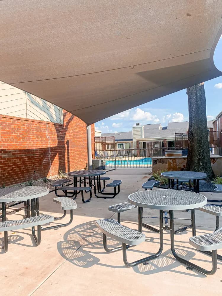 Arlington apartments for rent - image - Shaded Outdoor Seating Area.webp