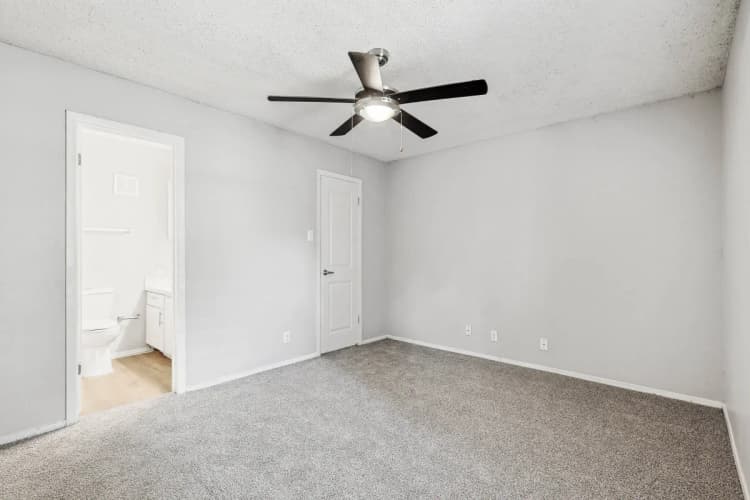 Arlington apartments for rent - image - Empty Room with Ceiling Fan.webp