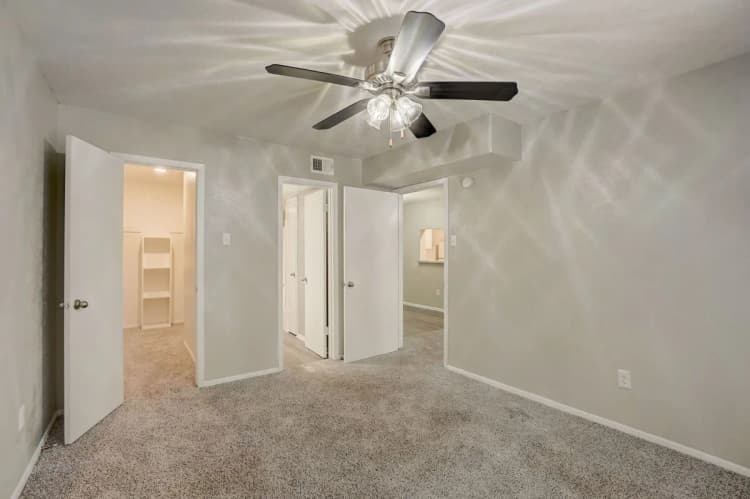 Arlington apartments for rent - image - Woodwind Apartments - Bedroom.webp