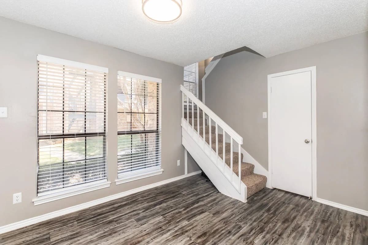 Arlington apartments for rent - image - Fielder Crossing - Living Room & Stairs.jpg